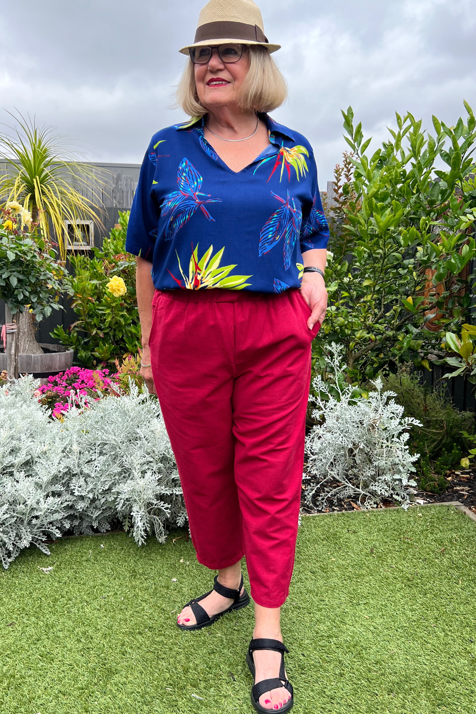Kita Ku modelling the new pant port in the Raspberry colour along with a Blue Paradise print top Rebecca. 