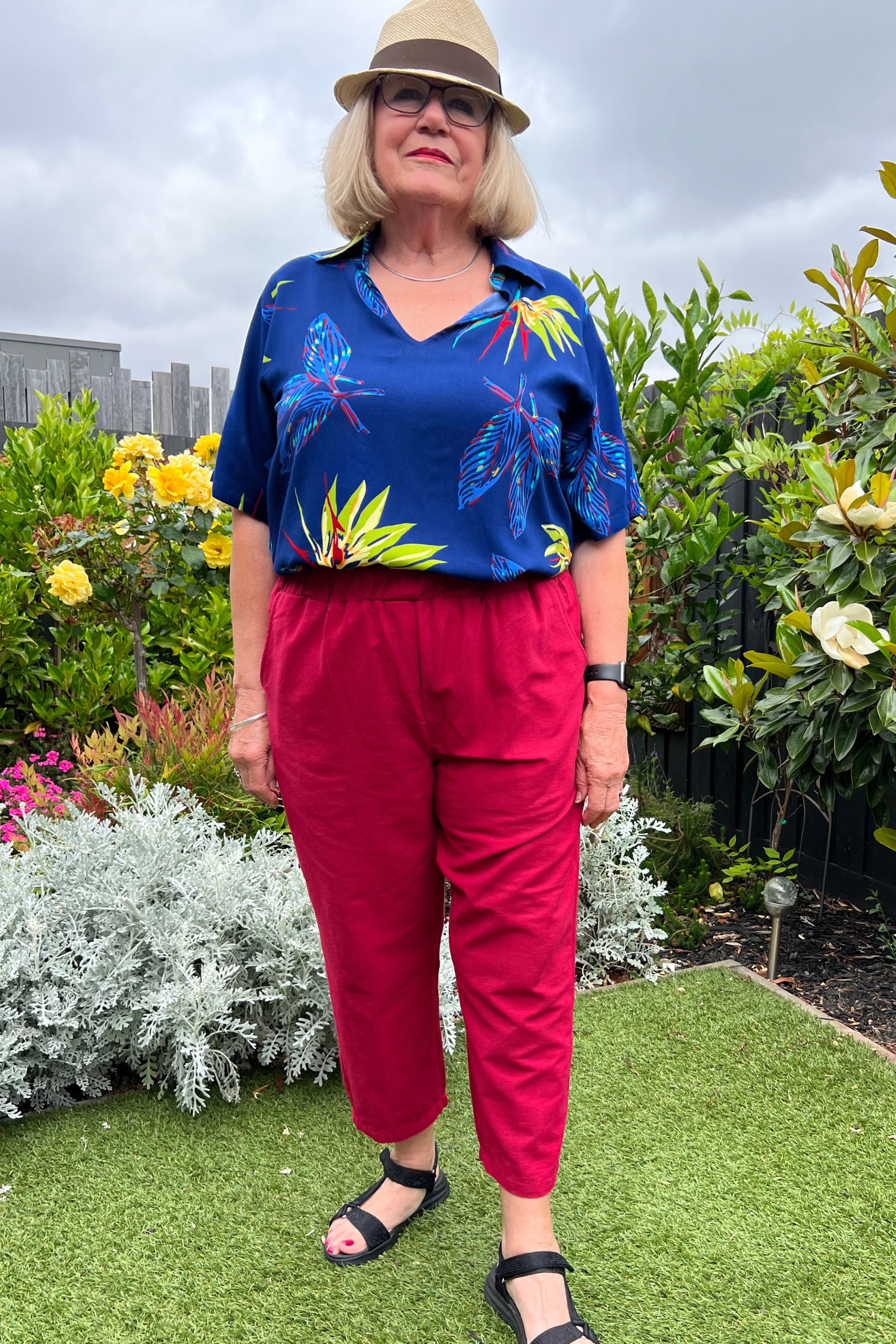 Kita Ku modelling the new pant port in the Raspberry colour along with a Blue Paradise print top Rebecca.
